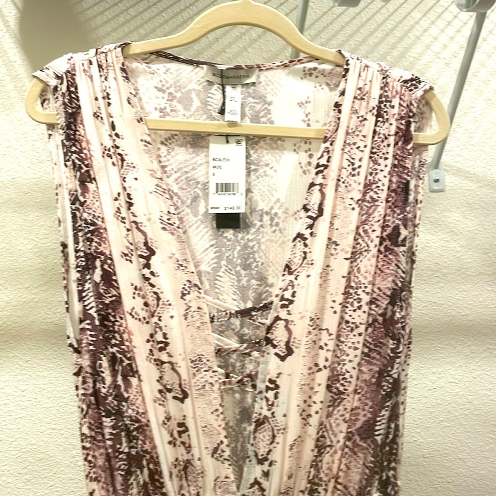 BCBG swim cover up. Beautiful piece, just too small on me. Never worn.